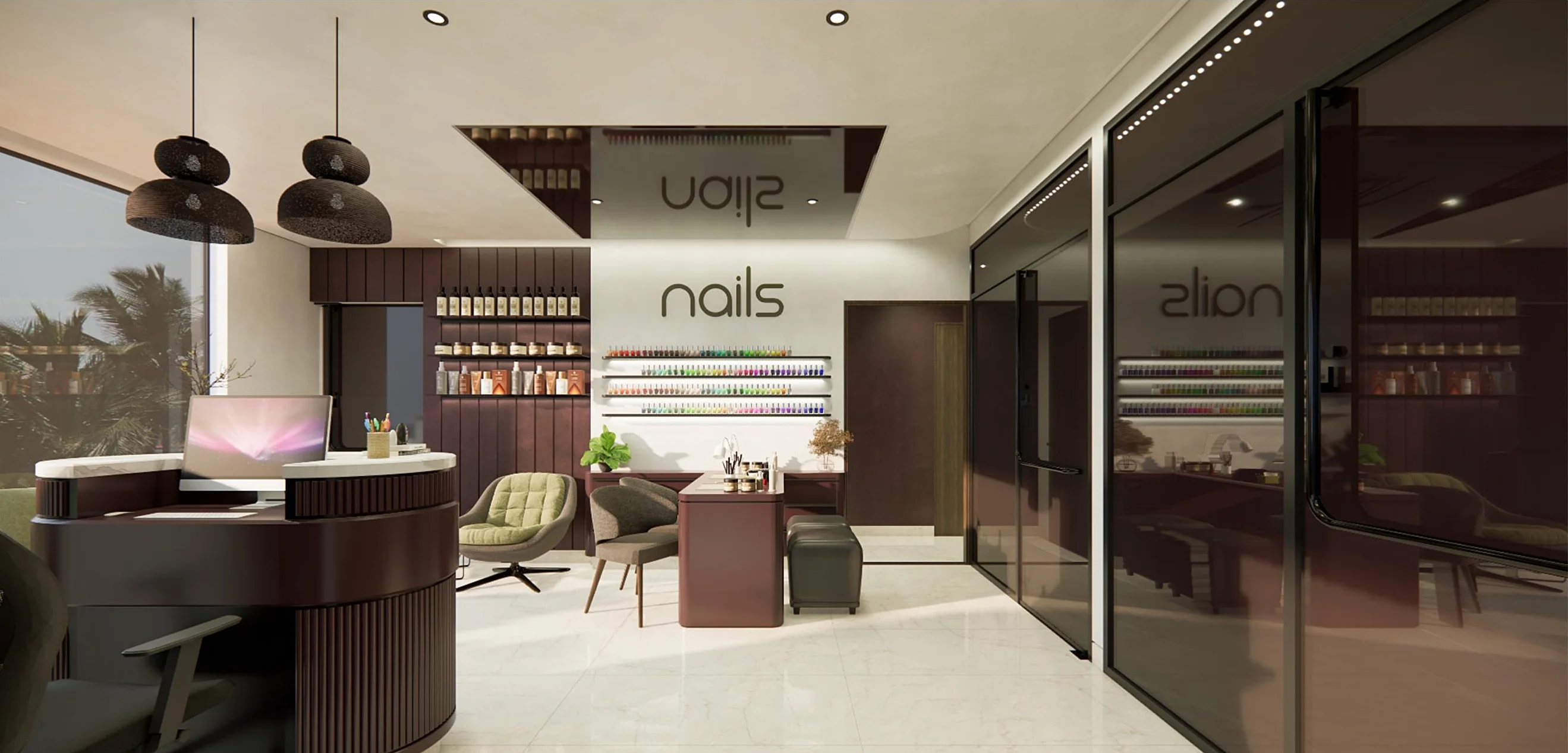The nail bar, a polish wall lit from below and two tufted chairs